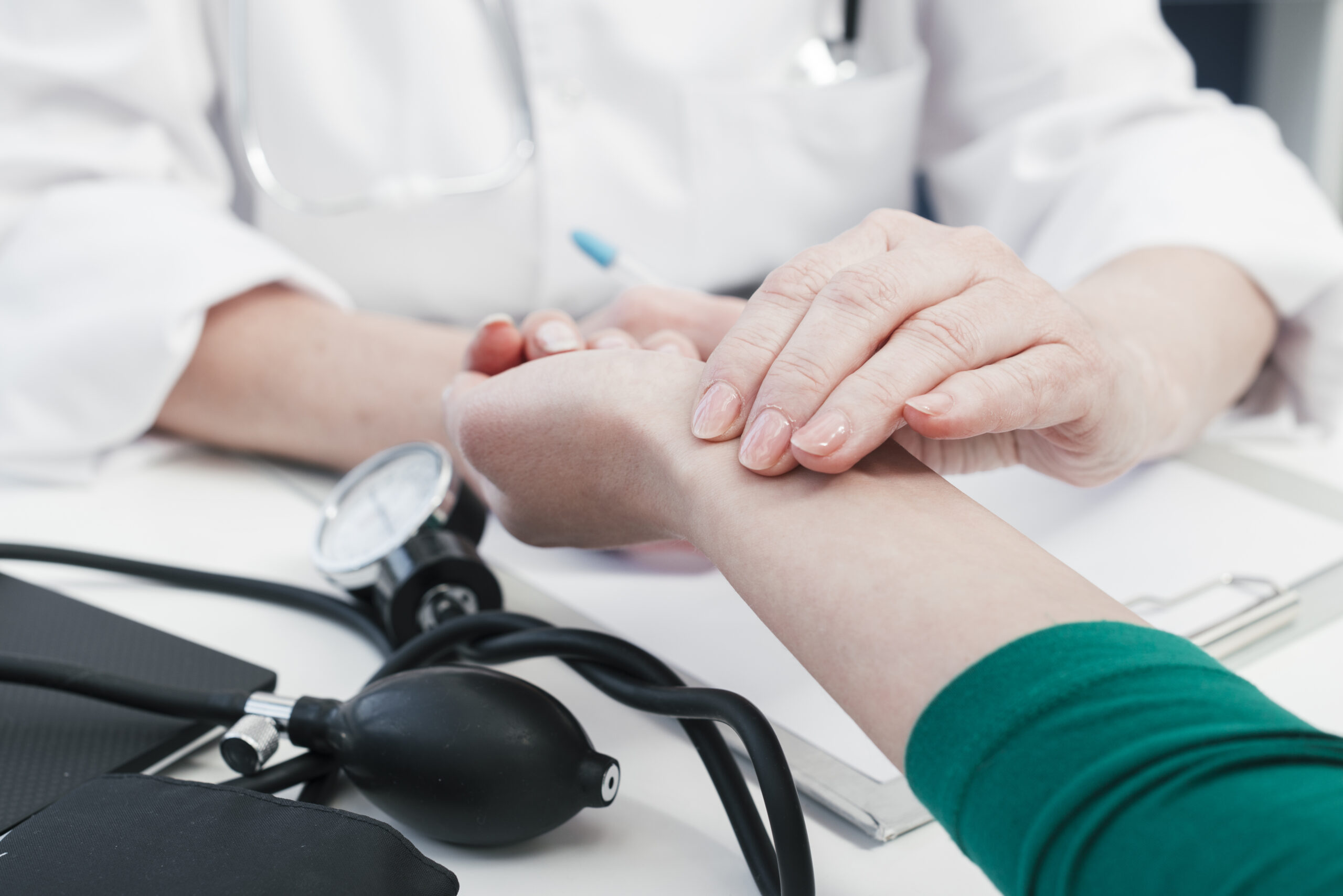 Doctor S Hand Tending Patient